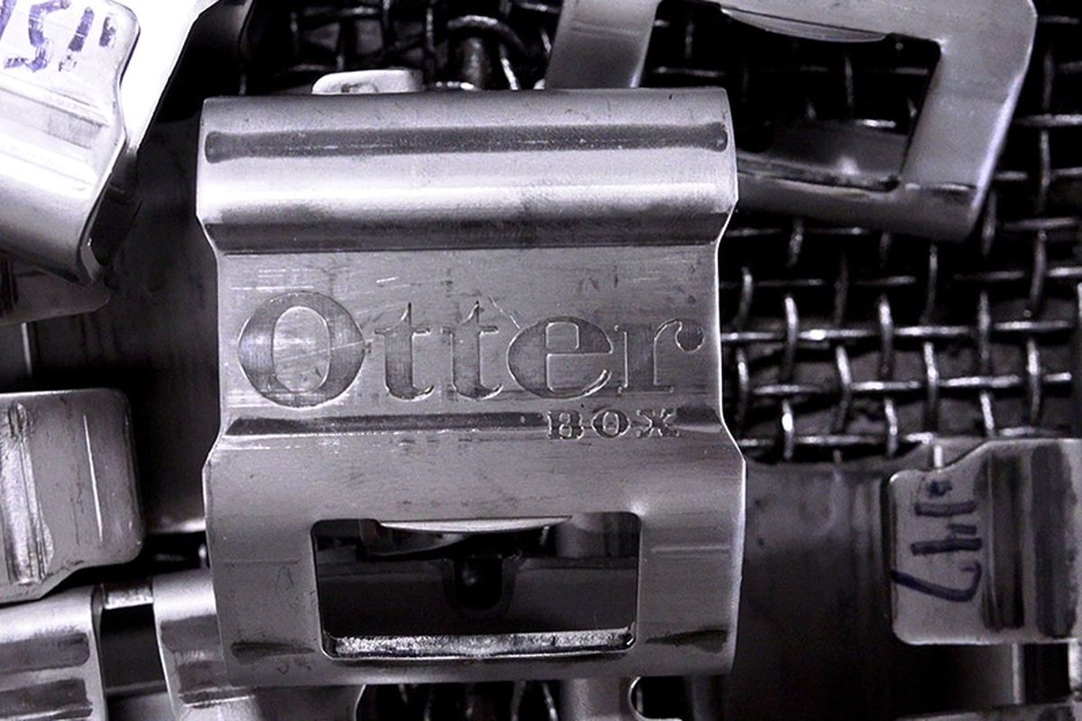 Stamped clips held in the die