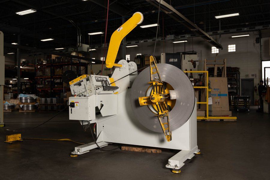 A coil loaded on a decoiler and straightener ready to feed a press